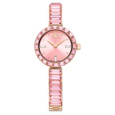 Elegance is amplified with crystals in this beautiful jewelry-inspired timepiece. The 25mm stainless steel design has a rose gold-tone finish and is encircled by a bezel with 20 baguette-cut pink crystals, while a single crystal is set within the crown. Baguette-cut crystals also highlight three index markers on the pink dial, which also features a swan logo at 12 o’clock. Around the wrist, the bangle-style bracelet is adorned with 16 baguette-cut crystals and is fully adjustable for a comfortab Gray Crystals, Swan Logo, Pink Watch, Bangle Watches, Pink Swarovski, Blue Watches, Rose Gold Watches, Bangles Style, Clear Crystals