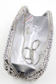 A Thoughtful Gift : With a timeless design and polished look, this accessories well with any collection, whether for your or as a gift celebrating friendship, birthdays and other memorable moments. Glamorous Crystal Evening Bag With Rhinestones, Chic Crystal Evening Bag For Events, Metal Evening Bag With Chain Strap For Party, Silver Formal Bag With Chain Strap, Elegant Bags With Metal Chain Strap, Silver Rectangular Evening Bag With Chain Strap, Glamorous Crystal Evening Bag With Bling, Glamorous Evening Bag With Chain Strap For Gift, Chic Crystal Evening Bag For Weddings