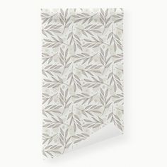 a white and gray wallpaper with leaves on it