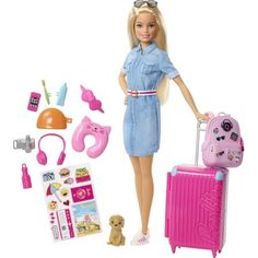 a barbie doll holding a pink suitcase and some items to pack up with her for the trip