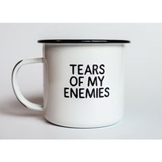 a white and black coffee mug with the words tears of my enemes printed on it