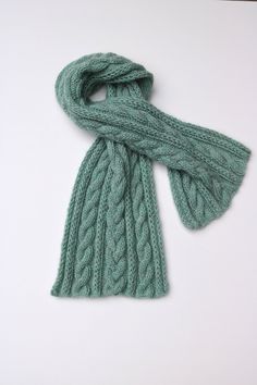 100% Wool Scarf  Colour is pale mint. 61 x 14 inch   Hand knit in Vancouver, British Columbia, Canada  during the snowy winter season. Green Knitted Scarf For Winter, Knit A Scarf, Cable Scarf, Wool Accessories, Yarn Gifts, Cable Knit Scarf, Snowy Winter, Crochet Clothing, Vancouver British Columbia