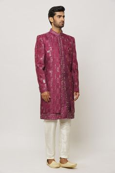 Dark pink sherwani with floral hand embroidery. Paired with a cream aligadi pant. - Aza Fashions Traditional Bandhgala For Reception During Diwali, Bollywood Style Festive Traditional Wear With Naqshi, Bollywood Traditional Wear With Naqshi For Festive Occasions, Diwali Reception Salwar Kameez With Naqshi, Festive Raw Silk Sherwani With Cutdana Details, Festive Raw Silk Sherwani With Cutdana, Naqshi Traditional Wear For Reception And Eid, Eid Naqshi Traditional Wear For Reception, Eid Reception Traditional Wear With Naqshi