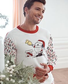 Sweet and festive adult unisex Snoopy candy cane mix-print pajama top in soft organic cotton rib knit. Made to last for holiday seasons to come! • Unique artwork only available at Hanna • Hypoallergenic & eczema-friendly • Sensory-friendly scratch-free seams that lay flat on the skin • OEKO-TEX® STANDARD 100 certified safe from hundreds of harsh chemicals 100% organic combed cotton rib knit Super-smooth flatlock seams Soft ribbed neck and cuffs Tops and pants offered separately for the very best Long Johns Pajamas, Unisex Pajamas, Sensory Friendly, Cuffed Top, Long John, Hanukkah Gifts, Print Pajamas, Hanna Andersson, Pajama Top