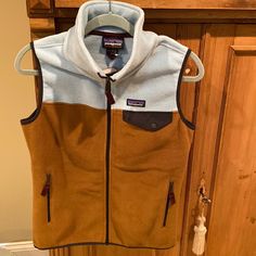 New Vest. Nice Color Combo. Casual Brown Midweight Outerwear, Casual Brown Outerwear For Hiking, Patagonia Brown Fall Outerwear, Patagonia Brown Outerwear For Fall, Patagonia Brown Outerwear For Outdoor Activities, Patagonia Brown Winter Outerwear, Patagonia Synchilla, Patagonia Jackets, Patagonia Womens