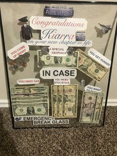 a glass case with money and stickers on it