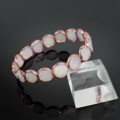 "GemFormingStudio D E T A I L S White Druzy Bangle | Multi Gemstone Bangle | Cute Bangle | Handmade Bangle | Bangle For Women | Bangle For Her, Gift For Women, Gift For Her Stone Size: 10 mm Weight: 15.98 gm Length: 2.5\" Aprx. Color: Rose Gold Material: Brass Polish: All Polish Available . Contact us for wholesale prices. R I N G S https://www.etsy.com/in-en/shop/GemFormingStudio?section_id=22783374 B E A D S https://www.etsy.com/in-en/shop/GemFormingStudio?section_id=22828835 W A N D S https:/ Adjustable Stackable Crystal Bracelet, Adjustable Stackable Round Crystal Bracelet, Adjustable White Round Cuff Bracelet, Adjustable Rose Gold Crystal Bangle Bracelet, Adjustable Rose Gold Round Crystal Bracelet, Round Hypoallergenic Rose Gold Bracelets, Adjustable Round Rose Gold Crystal Bracelet, Rose Gold Bangle Bracelets For Jewelry Making, Hypoallergenic Round Rose Gold Bracelets