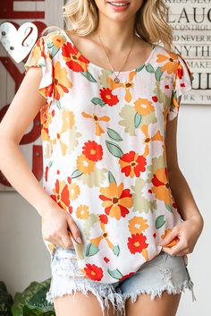 This blouse offers a unique combination of style and comfort. Featuring a round neck and flutter sleeves, the floral pattern gives it a classic yet modern feel. The lightweight and breathable fabric ensures all-day comfort. Sizing category: Regular Pattern type: Floral Style: Casual Features: Ruffle Neckline: Boat neck Length: Regular Sleeve length: Short sleeves Sleeve type: Flutter sleeves Material: 100% viscose Stretch: No stretch Sheer: No Body: Not lined Care instructions: Machine wash cold Round Neck Blouse, Graphic Tops, Floral Style, Flutter Sleeves, Blue Blouse, Bold Fashion, Floral Blouse, Boat Neck, Flutter Sleeve