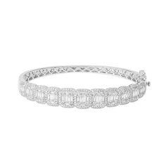 Prepare to turn heads with this spectacular diamond bangle. Crafted in cool 10K white gold, this design showcases shimmering baguette-cut diamond composites wrapped in cushion-shaped frames of additional diamonds. Captivating with 3 ct. t.w. of diamonds and a brilliant buffed luster, this hinged bangle measures 7.0 inches in circumference and secures with a tongue and groove clasp. Fine Jewelry White Gold Bangle With Baguette Diamonds, Diamond Accents Baguette Cut Bangle, Modern Diamond Bangle With Baguette Cut, Diamond Baguette Cut Bangle With Accents, Modern Baguette Cut Diamond Bangle, Elegant White Gold Bangle With Baguette Diamonds, Diamond Bangle With Baguette Diamonds For Anniversary, Luxury Diamond Bangle With Baguette Diamonds, Silver Diamond Baguette-cut Bangle