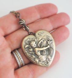 Mermaid Jewelry Mermaid Necklace Heart by chloesvintagejewelry Victorian Brass Necklace With Heart Charm, Vintage Brass Heart Shaped Jewelry, Vintage Brass Heart-shaped Jewelry, Vintage Heart-shaped Brass Jewelry, Vintage Brass Necklace With Heart Pendant, Vintage Bronze Heart Pendant Necklace, Vintage Bronze Necklaces For Valentine's Day, Vintage Brass Heart Necklace, Vintage Bronze Necklace For Valentine's Day