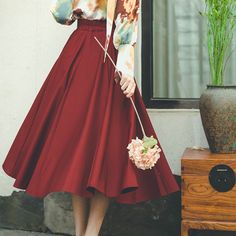 A wine-colored retro skirt that seems to be filled with a rich aroma. 
The high-waisted construction and wide waistband give it a vintage feel.
 Pair it with a retro blouse to look like a coffee-loving lady in the afternoon.



 <Size>



 S size






 Total length: 73cm

 Waist: 64-68cm




 M size



 Total length: 76cm

 Waist: 68-72cm











 <Material>



 polyester








 <Model worn>



 Wearing size



 M size




 model dimensions



 Height: 169cm

 Weight: 52kg









 <Oth Vintage Brown Flowy Skirt, High Waist Retro Pleated Skirt, Elegant Burgundy Pleated Skirt, Vintage Pleated Skirt For Fall, Chic Burgundy Midi Skirt, Vintage Full Pleated Skirt For Fall, Burgundy Flared Skirt For Fall, Vintage Flared Skirt For Fall, Vintage Fall Pleated Skirt