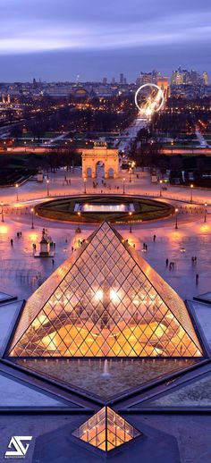 an aerial view of the pyramid at night