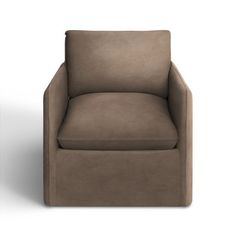 a brown chair sitting on top of a white floor