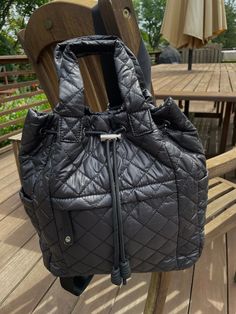 "NEW for the season! Quilted Backpack Drawstring close with snap Nylon Bag Inner pockets Zip pocket Work bag Outer pockets 2 Outer zip front pocket Pickleball bag Sports bag\" 11\" 3/4 high 11\" wide 4 1/3\" deep" Casual Backpack With Pockets For On-the-go, Sporty Nylon Shoulder Bag For On-the-go, Sporty Shoulder Bag With Pockets In Backpack Style, Sporty Shoulder Bag Backpack With Pockets, Sporty Shoulder Backpack With Pockets, Functional Nylon Shoulder Bag With Multiple Pockets, Nylon Travel Bag With Pockets For On-the-go, Black Nylon Tote Backpack, On-the-go Travel Backpack With Pockets