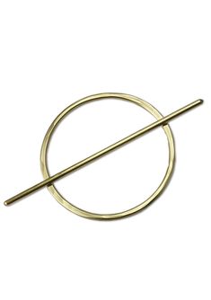 a round metal object with a long stick in it's center on a white background