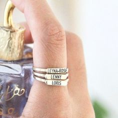 Transform your style with our Stackable Ring with Name! These dainty, customizable rings are perfect for a unique, personal touch. Available in gold, rose gold, and silver, mix and match for a trendy layered look or wear solo for classic elegance. Personalize each ring with names or words that mean the most to you. Imagine wearing the names of loved ones or words that inspire you every day! More than just accessories, these rings are personal statements. Treat yourself or find the perfect gift. Ready to shine? Personalize your stackable rings and tell your story. Order now and stand out with your unique style! Product Details:Material: High quality solid 925 Sterling SilverThickness: 1.2mm / 0.04″Pendant Size: 13mm x 3mm / 0.5" x 0.1" Font: As shown in image Package Includes:1 x Ring1 x Gi Ring With Name, Personal Statements, Rose Gold And Silver, Stackable Ring, Buy 1 Get 1, Layered Look, Stackable Rings, Classic Elegance, Name Necklace