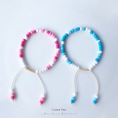 Celebrate the holiday season with a meaningful gift that symbolizes the special bond between a mother and her twins. Our matching bracelets set features "I Love You" in Morse code, making it a unique and heartfelt present for Christmas. ☘️This set includes: Two pink bracelets: One for mom and one for one of the twins. One blue bracelet: Ideal for the other twin. Crafted with high-quality seed beads and an adjustable Sliding Knot, these bracelets are designed to fit comfortably and be worn daily.  ☘️Key Features: Handmade with durable seed beads and an adjustable Sliding Knot for a customizable fit. Morse code message: "I Love You" adds a sentimental touch. Comes in a luxurious velvet bag, ready for holiday gifting. A thoughtful Christmas gift that captures the warmth and love of the season White Adjustable Bracelets For Birthday Gift, White Bracelets For Birthday Gift, Resizable Bracelets For Mother's Day, Resizable Bracelet For Mother's Day, Adjustable Letter Beads Jewelry For Gift Making, White Bracelets With Letter Beads For Gift, White Bracelets With Letter Beads For Gift Making, Adjustable Letter Beads Bracelet For Gift Making, Mom And Twins