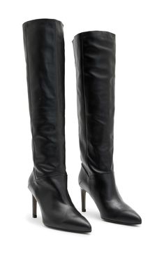 A foldover cuff adds easy versatility to a smooth leather boot complete with a pointy toe and stiletto heel. 3 1/2" heel 8 1/2"–12 1/2" shaft Pull-on style Leather upper and lining/synthetic sole Made in Spain Black Chelsea Boots, Boot Cuffs, Leather Boot, All Saints, Stiletto Heel, Smooth Leather, Leather Boots, Chelsea Boots, Combat Boots