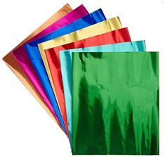 six different colors of paper bags on a white background