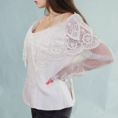 Scott McClintock Sportswear Deadstock NWT Vintage 80s Blouse! White bridal top with embroidered flowers, sheer sleeves and fold over top with lace applique details, plastic boning, and button closure up the back! Size 14 made in the USA!Bust: 41"Waist: 36" Spring Long Sleeve Lace Tops, Summer Party Tops With Lace Cuffs, White Long Sleeve Lace Top With Sheer Sleeves, White Sheer Long Sleeve Lace Top, White Spring Tops With Lace Cuffs, White Tops With Lace Cuffs For Spring, Feminine Party Tops With Lace Cuffs, Vintage Tops With Lace Sleeves For Summer, Spring Fitted Tops With Lace Cuffs