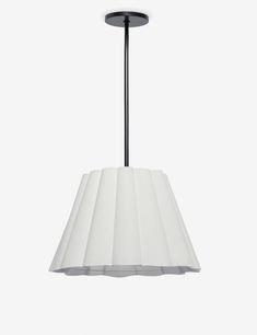 a black and white lamp hanging from a ceiling fixture with pleated shades on it