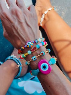 Shop the vacation-ready looks in our picks below, and you'll be set for summer. Catch the wave of these fun summer jewelry trends: Get them now before they're gone. Our beaded summer bracelets are a must in every summer wardrobe! kindly br advised large fuchsia eyes have marks in their body,it is part of the design,each piece is unique, as seen in listing pictures. PLEASE READ: PLEASE LEAVE A VALID CONTACT/PHONE NUMBER ,AS A NOTE AT ALL ORDERS,FOR THE SHIPPING SERVICE   All items are adjustable Cheap Casual Evil Eye Bracelet With Colorful Beads, Casual Cheap Evil Eye Bracelet With Colorful Beads, Affordable Multicolor Evil Eye Bracelet For Beach, Cheap Multicolor Evil Eye Bracelet For Beach, Cheap Multicolor Casual Evil Eye Bracelet, Evil Eye Preppy Bracelet, Evil Eye Made Of Beads, Cheap Multicolor Evil Eye Bracelet With Colorful Beads, Colourful Evil Eye Bracelet