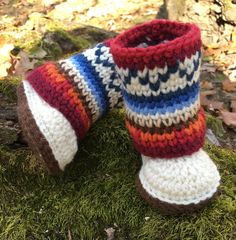 Colorful Fair Isle Baby Booties Crochet Pattern Looking for that perfect Fair Isle pattern for a little one in your life? Look no further! These booties are not only cute, but fun to make too! Once created, these colorful booties will be perfect for a precious bundle of joy during the holidays or any cold winter day. They also make great gifts! This pattern of the Fair Isle baby boots I have designed so that even a beginner will be successful. I have made this pattern to include sizes 0-3, 3-6, Cute Hand Knitted Winter Booties, Cute Hand Knitted Round Toe Booties, Crochet Yarn Booties With Round Toe, Yarn Booties With Soft Round Toe, White Crochet Round Toe Booties, White Crochet Booties With Round Toe, Crochet Booties With Round Toe For Winter, Baby Booties Crochet Pattern, Dishcloth Crochet Pattern