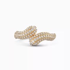 Inspired by stone carvings, Bixlers' artisans offer a bounty of diamonds nestled in a carved solid gold block. A note on our rare diamonds;Bixlers Sculpture pieces feature ethically sourced, rare “sawn diamonds” of VS diamond grade. Sawn diamonds are renowned for their octahedron crystal structure, displaying incredible luster. Luxury Baguette Cut Ring With Single Cut Diamonds, Luxury Diamond Ring With Single Cut Baguette Diamonds, Luxury Diamond Ring With Rose Cut, Luxury Baguette Cut Diamond Ring With Rose Cut Diamonds, Luxury Diamond Ring With Rose Cut Baguette Diamonds, Luxury Baguette Cut Rose Cut Diamond Ring, Luxury Rose Cut Diamond Ring With Baguette Shape, Exquisite Yellow Gold Diamond Ring With 17 Jewels, Luxury Formal Diamond Ring With Single Cut Diamonds