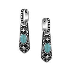 Like a beloved family heirloom, the Montana Silversmiths� Vintage Treasure Earrings hold value in their timeless style. Elegant, engraved swirls surround the oval-shaped turquoise center stone, giving the pendant a mesmerizing appeal. Crafted from silver-plated brass with painted detail, the Vintage Treasure earrings from Montana Silversmiths feature a protective coating and stainless steel latch back closure for easy wear. Earrings measure 1.1"H x 0.3"W. Stone color may vary. Mfrs. lifetime limited warranty. Manufacturer style #: ER5854.  Oval-shaped, crafted turquoise center stone;   Elegant, engraved swirl design;   Silver-plated brass with painted detail;   Protective coating;   Stainless steel latch back closure; Classic Oval Jewelry With Oxidized Finish, Earrings Turquoise, Swirl Design, Turquoise Earrings, Turquoise Stone, Easy Wear, The Vintage, Silver Pendant, Stone Color