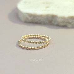 Elevate your style with our handcrafted 14k gold-filled stacking ring. Each ring is meticulously crafted, ensuring that every piece carries the artistry of handmade excellence. The result? A one-of-a-kind ring, as unique as you. This can be your everyday ring. Handcrafted in USA Sold by one ring DETAILS: Material: 14/20 Gold filled Dimensions: Width 1.4mm Note: As each piece is totally handcrafted dimensions and shapes can slightly vary ensuring no two are exactly alike. Extraordinary Jewelry, Dot Ring, Everyday Ring, Gold Bond, Everyday Rings, One Ring, Oils For Skin, Stacking Ring, Gold Filled Jewelry