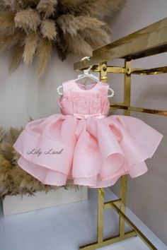 Make your little one feel like a princess with this stunning blush tutu dress, perfect for any special occasion! Whether she's a flower girl, attending a wedding as a guest, or celebrating her birthday party, she'll love the playful and girly design of this dress. The puffy skirt adds volume and movement, while the intricate floral lace detailing on the bodice and sleeves adds an extra touch of elegance. Handmade with care, this dress is perfect for your toddler or infant to make unforgettable memories in. She'll feel confident and beautiful in this special occasion outfit, and you'll love seeing her shine! Features: - knee length - puffy  skirt  - sleeveless  By request color can be other. We have more then 80 shades of tulle color ACCESSORIES   By request baby dress can be with:  - Baby Blush Birthday Party, Baby Birthday Dress, Puffy Skirt, Dress Tutu, Girly Design, Birthday Party Dress, Special Occasion Outfits, Girls Party Dress