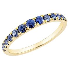 Elevate your jewelry collection with this stunning stackable ring, featuring a vibrant blue sapphire set in luxurious 14K yellow gold. The deep hue of the sapphire beautifully contrasts with the sparkling diamond accents that gracefully surround it, adding a touch of elegance and brilliance. Blue Sapphire Stackable Ring in 14Karat Yellow Gold. Blue Sapphire: 0.05 carat, 1.60mm size, round shape. Blue Sapphire: 0.06 carat, 1.70mm size, round shape. Blue Sapphire: 0.07 carat, 1.80mm size, round sh Yellow Gold Diamond Ring With Tanzanite In Prong Setting, Fine Jewelry Sapphire Half Eternity Ring, Blue Sapphire Half Eternity Ring In 14k Gold, Blue Sapphire Stackable Rings, Fine Jewelry Yellow Gold Sapphire Ring With Accent Stones, Yellow Gold Tanzanite Sapphire Ring With Accent Stones, Brilliant Cut Sapphire Birthstone Ring In Yellow Gold, Sapphire Stackable Rings With Gemstone, Brilliant Cut Sapphire Rings In Yellow Gold