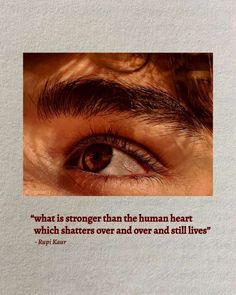 a man's eye with a quote about what is strong than the human heart which shakes over and over and still lives