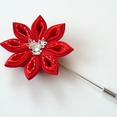 A flower is made in the technique of tsumami kanzashi. Flower is made from grosgrain and satin ribbons . crystal. Flower's d ~ 2 inches (5 cm). More lapels see here: https://www.etsy.com/shop/JuLVa?section_id=11777522&ref=shopsection_leftnav_4 At your request can be made a fower of a different color combinations. My handworks can be a unique gift for you, your family and friends! For more items, please visit my shop home: http://www.etsy.com/shop/JuLVa Please be aware that orders are sent vi Red Handmade Flower Brooches For Wedding, Red Flower Lapel Pin For Wedding, Red Handmade Flower Brooches, Handmade Red Flower Brooches, Red Flower-shaped Brooch With Handmade Flowers, Wedding Brooches, Flower Boutonniere, Flower Lapel, Fabric Flower Brooch