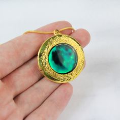 Beautiful resin locket necklace with bright colors. This locket is created using high-quality French resin and stain glass paints. The length of the pendant is about 1.25 inches (3.5 cm). The chain is brass with an anti-allergenic gold color coating. The length is 18 inches (46 cm). Worldwide shipping! ♥ Gift messages and gift packing Feel free to include a gift message and put it in the direct address of the receiver. We ship without a receipt and no unnecessary information will be spoiled. Add Resin Locket, Red Ocean, Niece Gifts, Stained Glass Paint, Colorful Necklace, Gift Packing, Photo Necklace, Wife Birthday, Necklace Red