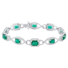 Tresor Diamond Bracelet features 1.96 cts diamond and 6.64 cts emerald in 18k white gold. The Bracelet are an ode to the luxurious yet classic beauty with sparkly diamonds. Their contemporary and modern design makes them versatile in their use. The Bracelet are perfect to be worn daily, at parties, music galas, charity events, conferences, and even weddings. Charity Events, Classic Beauty, Emerald Diamond, Pandora Charm Bracelet, Diamond Bracelet, Jewelry Bracelets, Emerald, Modern Design, Charm Bracelet