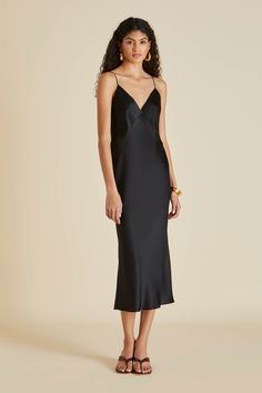 Our renowned silk slip dress ushers in a new era of luxury loungewear–the Issa Jet Black is an ultra-modern twist on the classic silk slip dress. The vivid colourway, the finest silk, the elegant bias cut–discover the perfect evening dress, for any occasion. \n\n Material: 100% silk Material Weight: 19 momme Material Weave: silk satin Colour: black Trims: adjustable flat straps Product Code: CT0012 Issa Dresses, Black Satin Slip Dress, Slip Dress Outfit, Holly Golightly, Olivia Von Halle, Luxury Loungewear, Slip Dresses, Black Slip Dress, Loungewear Luxury