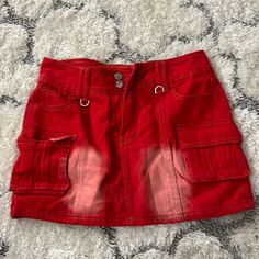 Red Jean Skirt. Size Large But Runs Small So Like A Medium. New With Tags. Red Casual Mini Skort, Casual Red Mini Skort, Red Casual Mini Length Skort, Red Skirt With Pockets For Spring, Red Spring Skirt With Pockets, High Waist Red Cotton Skort, Fitted Red Mini Skirt With Pockets, Red Y2k Style Summer Bottoms, Red Y2k Summer Bottoms