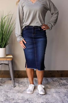 Becca Dark Wash Side Slit Denim Skirt. This stylish jean skirt features a dark wash for a sleek and sophisticated look that you can wear to work, school, or date night for fall winter outfits. Fall Modest Outfits Apostolic Fashion, Pentecostal Outfits Casual, Winter Modest Fashion, Jean Skirt Outfits Fall, Modest Denim Skirts, Skirt Classy, Pentecostal Outfits, Dark Denim Skirt, Modest Boutique