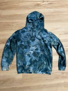 Amazingly soft and comfortable hoodie.  Hoodie can be worn with matching joggers or crop top to complete the lounge set.  Hand dyed with an ice dye technique Material 65% cotton 35% polyester.  Care Instructions: Best dye longevity will come from cold washes with a dye safe detergent or no detergent. Hang to dry. This will protect the material and brightness of the dyes. https://threadedmagicstudio.etsy.com Acid Wash Hooded Soft-washed Sweatshirt, Acid Wash Soft-washed Hooded Sweatshirt, Tie Dye Hoodie Sweatshirt For Streetwear, Tie-dye Relaxed Fit Hoodie For Streetwear, Tie Dye Relaxed Fit Hoodie For Streetwear, Acid Wash Relaxed Fit Hoodie, Casual Tie Dye Hoodie With Drawstring, Casual Tie-dye Sweatshirt With Drawstring Hood, Acid Wash Relaxed Fit Hooded Hoodie