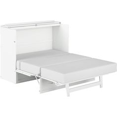 a white bed with a pull out drawer underneath it