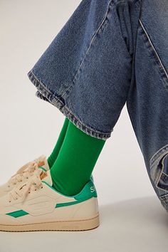 Just as effortless as the are essential, these timeless tube socks are featured in a calf-rise design with subtle logo detailing at back and bottom of foot for an added fun touch. **Features** Calf-rise style, soft knit fabrication, elasticated top hem, subtle logo detailing **Why We ❤ It:** Perfect to pair with anything from a stylish sneaker to a luxe loafer, these forever classic socks are sure to be a staple in your accessories collection for many years to come. | Happy Socks Solid Tube Sock Trendy Green Socks For Spring, Casual Green Knee-high Socks, Green Mid-calf Casual Socks, Casual Green Mid-calf Socks, Casual Mid-calf Green Socks, Casual Solid Color Knee-high Socks, Sporty Green Socks For Spring, Green Casual Knee-high Socks, Trendy No-show Socks For Spring