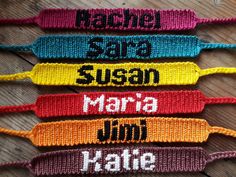 four lanyards with the names of different countries