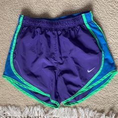 Size Extra Small, Never Worn, Perfect Condition, Purple, Green And Blue Purple Sporty Shorts For Spring, Purple Athletic Shorts For Spring Sports, Purple Athletic Shorts For Summer Sports, Sporty Purple Bottoms For Beach, Casual Purple Sports Shorts, Purple Sports Shorts For Summer, Sporty Purple Athletic Shorts For Summer, Sporty Purple Beach Bottoms, Stretch Nike Shorts In Purple