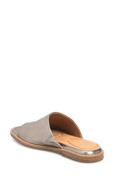 This laidback slide sandal is summertime-ready with a cushioned footbed lined in breathable leather. Cushioned footbed with arch support Leather upper and lining/synthetic sole Imported Comfortable Open Toe Slip-ons With Leather Footbed, Comfortable Summer Slip-ons With Ortholite Insole, Beach Slip-ons With Cushioned Footbed And Flat Heel, Casual Slip-on Slides With Textured Sole, Leather Slide Sandals With Arch Support, Summer Slip-on Mules With Arch Support, Casual Slide Footbed Sandals With Ortholite Insole, Comfortable Flat Heel Synthetic Mules, Slip-on Synthetic Mules With Cushioned Footbed