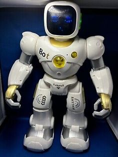 a white and yellow robot is in a blue box with its hands on it's hips