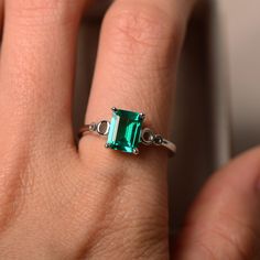 This ring features a 6*8mm lab grown emerald and sterling silver finished with rhodium. Customization is available. It is made by hand, and it will take about 7 days to finish the ring after your payment is completed. Main stone: lab emerald Main stone weight: Approx 1.40 ct Metal type: sterling silver finished with rhodium Customization is available, I also can make it with 14k solid gold (white or yellow or rose), just feel free to contact me. Any question, just let me know. :) Emerald is May Classic Emerald Ring For Promise, Emerald Cut Sterling Silver Solitaire Birthstone Ring, Emerald Cut Solitaire Birthstone Ring In Sterling Silver, Sterling Silver Emerald-cut Emerald Ring For Promise, White Gold Emerald Birthstone Ring In Emerald Cut, Silver Emerald Cut Birthstone Promise Ring, Emerald Cut Sterling Silver Ring For Promise, Promise Emerald Cut Emerald Ring With Accent Stones, Green Center Stone Birthstone Ring In Sterling Silver