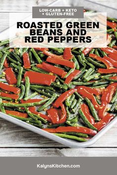 roasted green beans and red peppers on a white plate