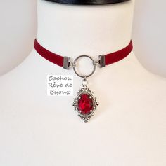 Victorian style velvet choker necklace with a beautiful intense red crystal. -------------- Details ---------------- - Real oval faceted cut crystal: 13x18mm - Vibrant color: dark red - Victorian pendant set with claws in antique silver-colored brass: 45x25mm - Choker in dark red velvet and stainless steel findings: 32-39cm with the extension to adjust to your convenience (contact me for another length) - Several colors available in my store -------------- Delivery -------------- The jewelry is Dark Red Velvet, Victorian Accessories, Velvet Choker Necklaces, Victorian Pendants, Vintage Choker, Velvet Choker, Gift Love, Victorian Gothic, Red Crystals