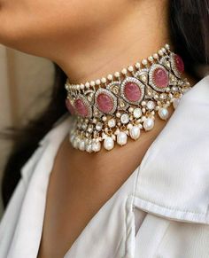 Pretty fine Kundan choker with carved faux Pink Sapphire colored stones necklace with matching earrings The set has Fine Setting of Kundan and Cz setting in a Victorian style look choker set with beautiful Pearl hangings Highest quality and craftsmanship. Arrives in a box Please let me know if Diamond Choker Set, Victorian Choker, Kundan Choker Set, Sabyasachi Jewellery, Kundan Choker, Stones Necklace, Indian Jewelry Sets, Onyx Jewelry, Real Jewelry